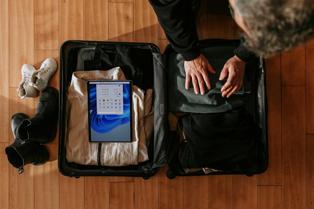 A neatly organized packing list with essential items for flight crew, including uniforms, safety gear, and personal items, laid out on a table.